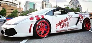 red and white Lamborghini with tire stickers